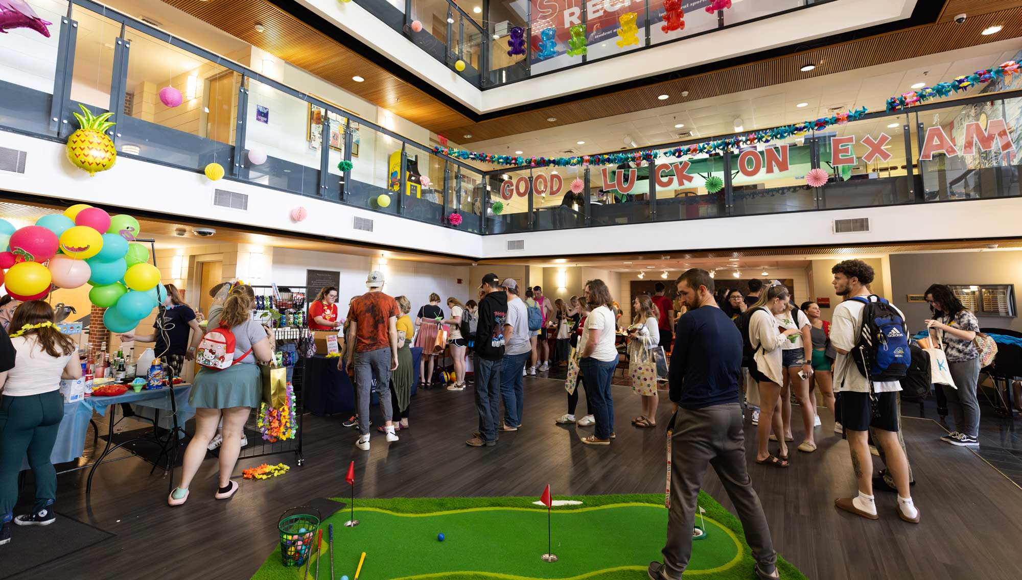 Students participating in activities in Student Center atrium