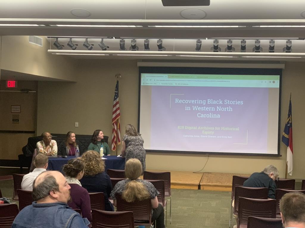 Person presenting at podium