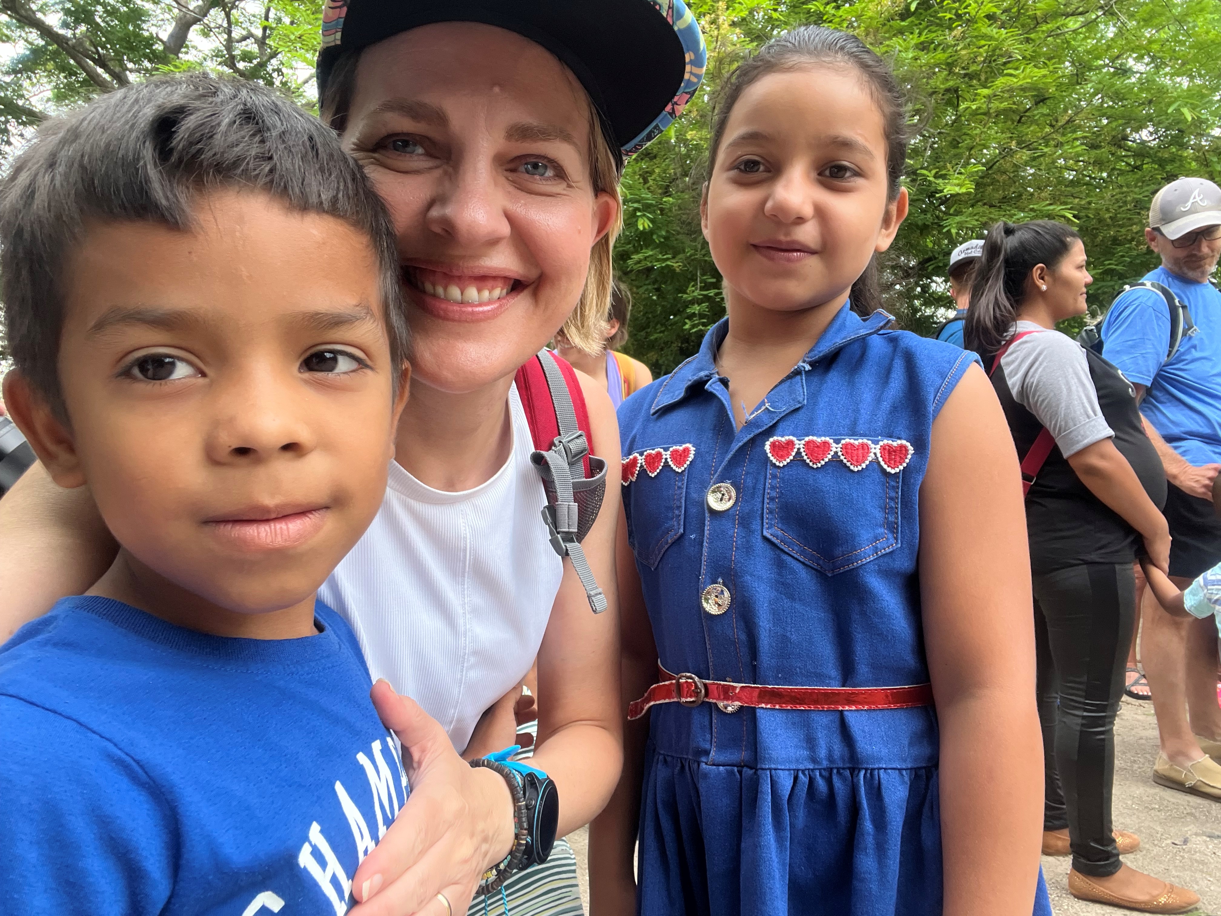 Woman smiling with children