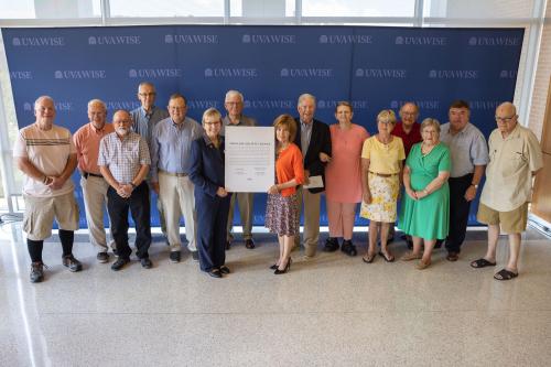 Twinleaf members with Chancellor Henry