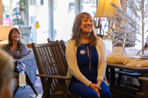 Woman sitting in chair smiling