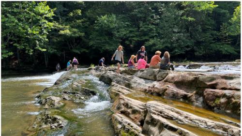 Students by river