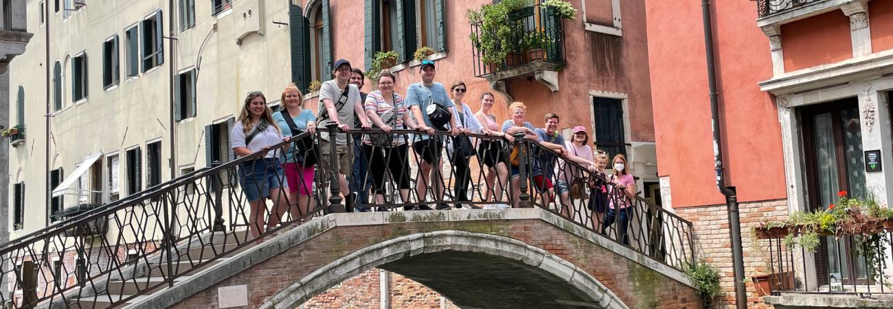 Group standing on bridge