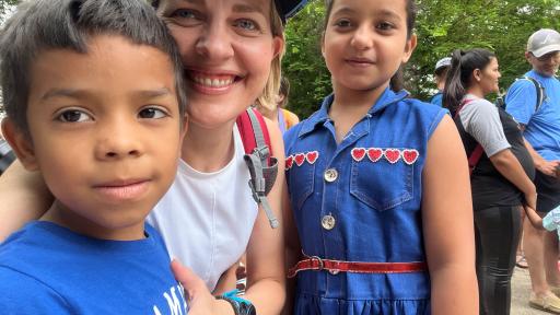 Woman smiling with children