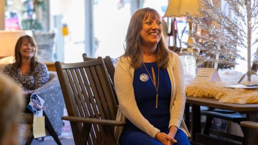 Woman sitting in chair smiling