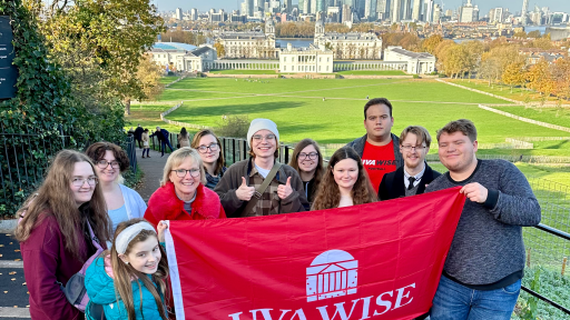 Group of students posing with UVA Wise flag